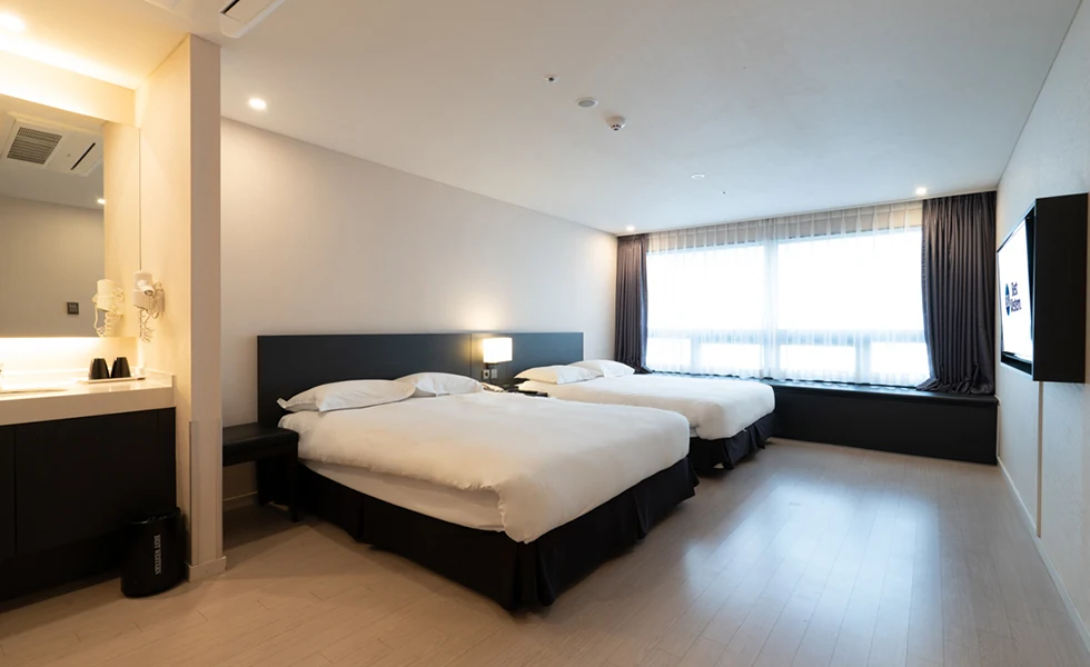 Best Western Jeju公式Deluxe Family Twin、ダブルベッド2台の客室